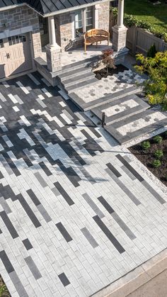 an aerial view of a house with steps leading up to the front door and patio