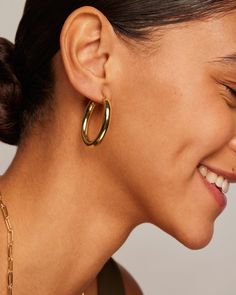 With an elongated sleek silhouette, these hoops are a must-have for the modern woman. Throw them on with a sundress in the summer, or turtleneck and updo in the winter, and look effortlessly chic. 925 Sterling Silver post14KT yellow, rose or white gold platedMeasurements: Width: 25mm (.98”); Height: 30mm (1.12”) Chunky Jewelry, Toggle Bracelet, Beaded Anklets, Bracelet Collection, Chain Earrings, In The Winter, Tennis Bracelet, Yellow Rose, Pearl Jewelry