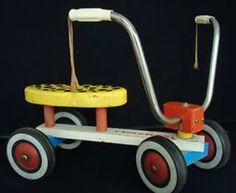 an old fashioned tricycle with wheels on black background