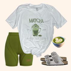 R Embrace the tranquility and invigorating spirit of your favorite matcha beverage with our latest "Matcha Tea Latte" tee from the Coffee Break Collection. This stylish piece artfully depicts a freshly brewed matcha tea latte, featuring detailed illustrations of its ingredients and preparation. Rendered in calming shades of green, this tee is designed for both comfort and sustainability, making it a must-have for eco-conscious fashionistas and coffee enthusiasts alike. Outfit Suggestions: Active Casual Green Tops For Relaxation, Green Spring Tops For Relaxation, Spring Green Tops For Relaxation, Matcha Green Outfit, Matcha Outfit, Matcha Shirt, Coffee Clothes, Barista Outfits, Vanilla Frappuccino