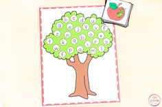 an apple tree is shown with the words abc and w in front of it, along with two matching cards