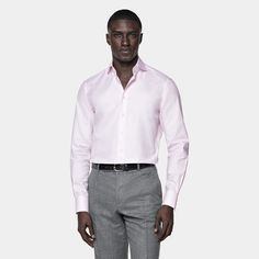 A classic tailored fit button-up with a versatile curved cutaway collar, this vivid pink shirt is  the perfect way to infuse your look with some bright seasonal color. Pink Long Sleeve Dress Shirt For Business Casual, Pink Slim Fit Shirt For Formal Occasions, Formal Spring Pink Shirt, Fitted Pink Shirt For Work, Pink Dress Shirt With Spread Collar For Work, Pink Spread Collar Shirt For Work, Pink Spread Collar Dress Shirt For Work, Pink Fitted Dress Shirt For Business Casual, Pink Fitted Shirt For Office