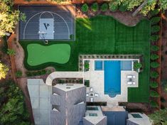 an aerial view of a house with a swimming pool