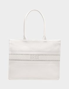 BRIDE TOTE WHITE White Wedding Gift Bag, White Canvas Bag With Dust Bag, Wedding Gift Bag Tote, Chic White Wedding Bag, Chic White Wedding Bags, Wedding Gift Tote Bag, White Rectangular Bags For Bridesmaid Gift, Bridal Essentials, Bachelorette Tote