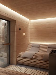 a sauna room with wooden walls and flooring