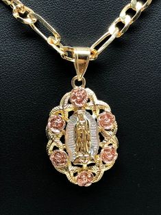 Brand new 26 inch gold laminated chain with Virgin Mary medal with tri color engraved flowers. Beautifully designed to look identical to the 14k Mexican Pendant. Chain is 24 inches 4mm, or 26 inches 5mm. Comes packaged inside an individual box. Guadalupe Necklace, Quinceanera Jewelry, Virgin Mary Pendant, Mary Necklace, Pretty Jewelry Necklaces, Wrist Jewelry, Jewelry Accessories Ideas, Dope Jewelry, Figaro Chain