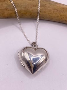 "Vintage heart locket  925 sterling silver  About an inch long without bale.  on a 925 sterling silver chain 16, 18 ,20, 22\" or 24\" Lovely etched design Can hold tiny sized photo. Laminate photo before inserting for longevity  Thank you for supporting a small veteran owned business! All jewelry is shipped free within the US in a stylish gift box" Cheap Silver Locket Charm Necklaces, Heart-shaped Nickel-free Locket Necklace For Memorial, Nickel-free Heart Locket Necklace For Memorial, Memorial Heart-shaped Nickel-free Locket Necklace, Silver Sterling Double Heart Locket Necklace, Classic Heart-shaped Memorial Jewelry, Classic Heart Shaped Memorial Jewelry, Sterling Silver Heart Locket Necklace For Memorial, Sterling Silver Open Heart Locket Necklace For Memorial