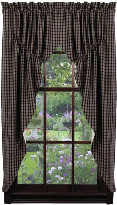 an open window with a checkered curtain and valance in front of the window