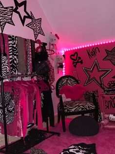 a room with zebra print and pink lighting