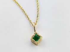 Enchant her this Christmas with memorable gift of this gold emerald necklace. It is made by hands in my little workshop in solid 14k gold. The stone is natural, coming from Earth- not synthetic or lab created. This necklace is in minimalistic style so the woman who loves delicate jewelry is bound to fall in love with it:) The stone is vivid, full of life, beautiful green. It matches perfectly with the square emerald ring from minimalistic collection and square emerald earrings. If you are lookin Yellow Gold Emerald Necklaces As A Gift, Green Diamond-cut 14k Gold Necklace, 14k Gold Green Diamond Cut Necklace, Gold Emerald Necklace As Gift, Gold Emerald Necklace In 14k As A Gift, Gold Emerald Necklace In 14k Gold As Gift, 14k Gold Emerald Necklace For A Gift, 14k Gold Emerald Pendant Necklace, Yellow Gold Emerald Necklace As Gift