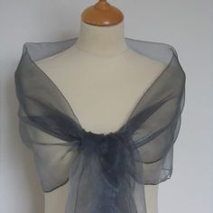 "This pewter/ dark grey organza wrap/shawl would be perfect for bridesmaids, prom, wedding guest or going to the races. Also listed is a matching dolly bag, wedding pouch. It has a soft draping quality. It has a roll edge finish. Dimensions 78\" x 18\"                        200 cm x 46 cm Gentle wash,    do not tumble dry" Wedding Pouch, Star Shawl, Wedding Shawls, Grey Wedding Dress, Shawl Wedding, Wedding Shrug, Evening Shawls, Pashmina Wrap, Bolero Wedding