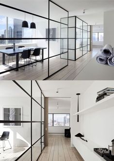 the interior of a modern home with white walls and wood flooring, black accents