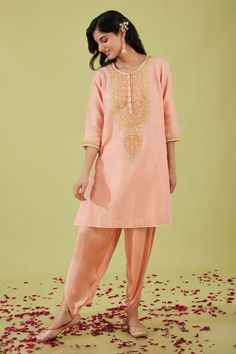 Pink three fourth sleeves short A-line kurta with bloom yoke embroidery using gota, moti sequins and zari nakshi highlights. Paired with a samosa pant. - Aza Fashions Festive 3/4 Sleeve Sets, Traditional Kurta With 3/4 Sleeves And Floral Embroidery, Traditional Kurta With Floral Embroidery And 3/4 Sleeves, Traditional Floral Embroidered Kurta With 3/4 Sleeves, Traditional Mirror Work Kurta For Spring, Bollywood Style Kurta With Mirror Work For Spring, Festive Sets With Resham Embroidery And 3/4 Sleeve, Spring Festive Salwar Kameez With Mirror Work, Eid Kurta With Floral Embroidery And 3/4 Sleeve