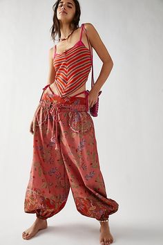 Retro-inspired bandana top featured in a strapless, cropped silhouette with ruched elastic back and pointed bottom hem. * Effortless, pull-on style * Classic bandana print * Bandeau silhouette | FP One Raya Bandana Top at Free People in Red, Size: L Red Wide Leg Pants, Bandana Top, Balloon Pants, Bandana Print, Floral Pants, Shoulder Crop Top, Red Stripe, Boho Floral, Retro Inspired