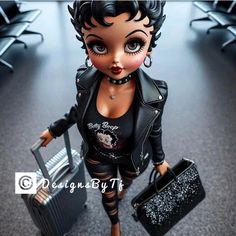 a doll with black hair carrying a suitcase