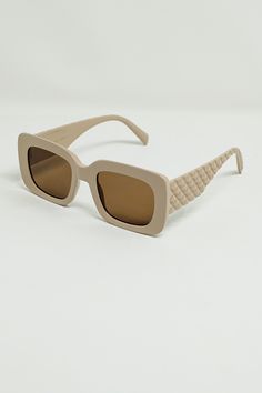 Enhance your style with our Oval Sunglasses with Smoke Lens in Beige. These sunglasses feature a trendy oval shape and are designed with 100% polycarbonate for durability and UV protection. The model is wearing size U, and these sunglasses are suitable for all face shapes and sizes. The beige frame adds a touch of sophistication, while the smoke lens provides a stylish and versatile look. Whether you're heading to the beach or strolling through the city, these sunglasses will elevate your outfit Timeless Sunglasses, Photography Gifts, Makeup Stain, Oval Sunglasses, Oval Frame, Elevate Your Style, Hat Hairstyles, Beige Color, Face Shapes