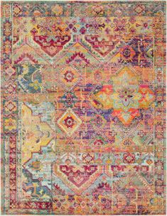 an orange, yellow and pink rug with many different colored designs on the bottom half