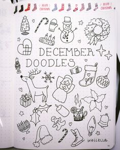 a notebook with doodles written on it and christmas themed items in black ink, sitting on top of a table