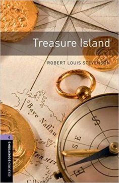 a compass and some gold coins sitting on top of a map with the words treasure island