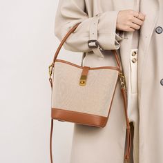 Brown&Beige Canvas Bucket Bag Twist Lock Crossbody Handbags | Baginning Beige Bucket Baguette Bag For Daily Use, Trendy Brown Bucket Canvas Bag, Beige Pouch Satchel For Office, Beige Crossbody Baguette Bag For Office, Beige Canvas Crossbody Bag, Brown Leather-handled Crossbody Box Bag, Brown Bucket Canvas Bag For Daily Use, Brown Top Handle Canvas Bag With Adjustable Strap, Brown Bucket Canvas Bag For Shopping