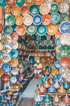 many plates are on display in a store