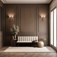 an elegant living room with wood paneling and white furniture, along with two side tables