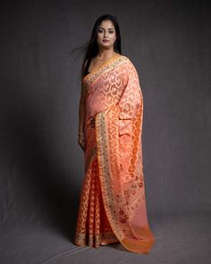 Peach Banarasi Resham Jaal Cutwork Brocade Woven Cotton Silk Saree with Meenekari Border Pallu Chanderi Meenakari Pre-draped Saree For Navratri, Traditional Orange Banarasi Silk Pre-draped Saree, Traditional Orange Georgette Pre-draped Saree, Navratri Brocade Pre-draped Saree With Cutdana, Bollywood Style Semi-stitched Traditional Wear With Meenakari, Transitional Orange Cutdana Choli, Semi-stitched Brocade Pre-draped Saree With Zari Work, Jamawar Blouse Piece For Puja, Transitional Semi-stitched Orange Dupatta