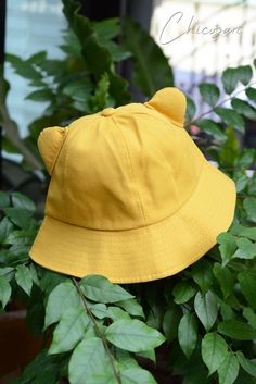 🌸Kawai handmade bucket hat  🌸Feature a raw edge brim and inner seams 💐Beautiful cap sew the wings are not wrinkled. Measurements:  57-58 cm circumference Suitable for head size 54-56 cm The length of the hat is about 6-6.5 cm Hat depth/hat height 8-8.5 cm Care : please cool hand wash or spot clean with a damp cloth.Dry flat inthe shade. Cheap Yellow Women's Bucket Hat, Yellow Cotton Bucket Hat With Short Brim, Casual Cat-ears Hat With Cat Design, Yellow Brimmed Cotton Bucket Hat, Yellow Cotton Brimmed Bucket Hat, Handmade Casual Cat Ears Hat, Hat With Cat Ears, Yellow Bucket Hat, Yellow Hat