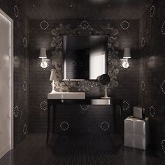 a black and white bathroom with an ornate mirror above the sink, lights on either side