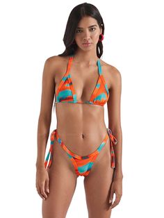 Eye-catching triangle top, featuring a vibrant placement print that adds a unique and artistic touch to your swimwear collection. This top includes removable pads for adjustable comfort and support, and it ties at the back and neck for a customizable, secure fit. Perfect for beach days or lounging by the pool, this top combines functionality with standout style. Check out versatile bottom, designed with a stylish placement print that makes a bold statement. Available in both skimpy cheeky and fu Adjustable Multicolor Tie-side Swimwear, Luxury Multicolor Tie-side Swimwear Bottom, Orange Triangle Top Swimwear With Built-in Bra, Multicolor Tie-side Bottom Swimwear With Drawstring, Multicolor Stretch V-neck Swimwear, Triangle Top, Boys Swimwear, High Leg, Cover Up Dress