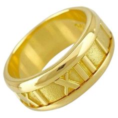 TIFFANY & CO. Atlas 18K Gold 7mm Wide Numeric Ring 5 Metal: 18K Yellow Gold Size: 5 Band Width: 7mm Weight: 8.0 grams Hallmark: TIFFANY&CO. © 1995 750 ITALY Condition: Excellent condition Limited edition, no longer available for sale in Tiffany stores Authenticity Guaranteed Tiffany Atlas Rings, Tiffany And Co, Tiffany & Co., Band Rings, 18k Gold, Jewelry Rings, Yellow Gold, Band, For Sale