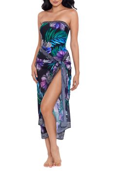 A gorgeous print amplifies the breezy vibe of a resort-ready pareo that may be tied as a sultry skirt or cover-up dress. Tie closure 100% polyester Hand wash, line dry Imported Floral Print Wrap Beachwear Cover-up, Elegant Floral Print Swimwear For Beach Season, Floral Print Sarong For Beach Cover-up, Tropical Wrap Swimwear Beach Cover-up, Tropical Wrap Beach Cover-up Swimwear, Tropical Wrap Swimwear For Beach Party, Chic Printed Beach Dress For Beach Party, Chic Tropical Print Swimwear For Beach Season, Elegant Multicolor Swimwear For Vacation