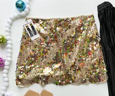 This is THE skirt you need for al the fun and adventures you plan to have this holiday season. The sequins are varying in sizes and the scalloped edge of this mini skirt will have you appreciating the design so much. True to size. Janell (blonde) is 5'5" and a size 6 wearing size small. Judy (gray) is 5'3" and a size 4 wearing size small. Clearance is FINAL SALE. Items ending in $.98 indicate Clearance. Festive Sequined Mini Skirt For Summer, Festive Mini Skirt With Sequins For Party Season, Sequined Mini Skirt For Costume Party, Festive Mini Skirt For Party Season, Fitted Mini Skirt For Festive Party Season, 2024 Clothes, Outfit Party, Sequin Party, Party Skirt