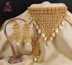 Exclusive design Indian traditional gold plated polki choker jewelry with earrings and maang tikka. Luxury Diwali Choker With Intricate Design, Luxury Gold Kundan Tikka, Luxury Traditional Necklaces For Festivals, Luxury Gold Temple Necklace For Diwali, Luxury Gold Ceremonial Tikka, Luxury Elegant Gold Tikka, Luxury Gold Elegant Tikka, Necklace Gold Design, Indian Choker Necklace Gold