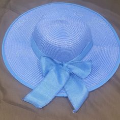 Women's Sun Hat Blue With Bow New Blue Flat Brim Sun Hat For Beach, Light Blue Summer Hat, One Size Fits Most, Light Blue Summer Hat (one Size Fits Most), Light Blue Beach Hat One Size Fits Most, Light Blue Beach Hat One Size, Blue Boater Hat With Curved Brim For Beach, Blue Flat Brim Boater Hat For Beach, Casual Blue Straw Hat One Size, Light Blue Sun Hat With Curved Brim For Beach