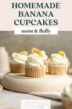 homemade banana cupcakes with white frosting and orange slices on top, sitting on a plate