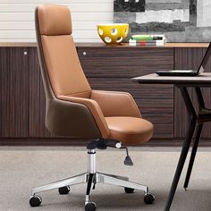 an office chair sitting in front of a desk