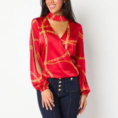 Make a style statement for the office or drinks with this Bold Elements women's satin blouse. This pullover stretch-jersey top has a cut-out v-shaped mock neckline, long split puffed sleeves and a back button-loop closure. Pair yours with pants and pointed-toe pumps. Closure Type: Elastic Loop&buttonFit: Regular FitNeckline: V NeckSleeve Length: Long SleeveSleeve Style: Split SleeveApparel Length: 29 InchesFiber Content: 97% Polyester, 3% SpandexFabric Description: SatinCare: Tumble Dry, Machine Large Shirts, Mock Neckline, Satin Blouse, Jersey Top, Red Blouses, V Shape, Puff Sleeve, Cut Out, Shirts Tops