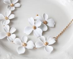 more Artsy and Sophisticated necklaces and earrings in DearDanielleJewelry: https://www.etsy.com/shop/DearDanielleJewelry?ref=seller-platform-mcnav&section_id=28433487 White wedding flower necklace. Bride necklace, Bridesmaid necklace. Spring and summer flower necklace. **framed gems and charms are gold plated which means you can have beautiful and trendy jewelries in more affordable price. *All the jewelry in my shop will be sent in cotton pouch. If you want gift box wrapping, please let us Wood Hoop Earrings, White Flower Earring, Box Wrapping, Wedding Earring, Bride Necklace, Geometric Hoop Earrings, Earring Wedding, Cotton Pouch, Flower Earring