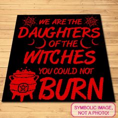 we are the daughters of the witches you could not burn on a black background with red lettering