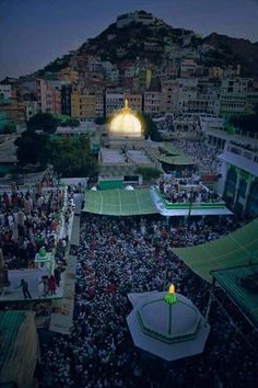 an aerial view of a large crowd at night