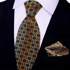 Shades of Brown Geometric Tie Embark on a sartorial adventure with our stunning shades of brown geometric honeycomb pattern silk luxury necktie. This exquisite accessory is meticulously crafted to showcase a captivating blend of geometric shapes and rich hues, making it a true statement piece for the modern gentleman. The intricate honeycomb pattern, rendered in various shades of brown, creates a mesmerizing visual texture that draws the eye in. The interplay of geometric shapes adds depth and d Tie Length, Brown Leather Shoes, Rich Color Palette, Visual Texture, Honeycomb Pattern, Brown Silk, Modern Gentleman, Shades Of Brown, Silk Necktie