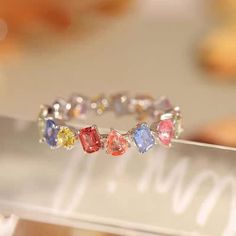 Description:Colorful Rainbow Rhinestone RingSpecifications:Material: rhinestone, copper, silverSize: #7 adjustableWeight: 4 g/pcs Add a pop of color to your outfit with our Colorful Rainbow Rhinestone Ring! This quirky piece features vibrant rhinestones arranged in a rainbow pattern, making it a fun and playful accessory. Perfect for anyone who wants to add a touch of personality to their look. 🌈 Trendy Multicolor Rings For Party, Trendy Multicolor Open Ring Jewelry, Multicolor Open Ring For Party, Adjustable Multicolor Crystal Ring For Party, Adjustable Multicolor Stone Rings, Multicolor Crystal Rings For Gift, Adjustable Multicolor Crystal Promise Ring, Rainbow Ring For Party Jewelry, Rainbow Ring For Parties