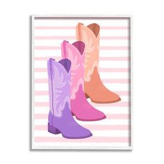 three pairs of cowboy boots on a pink and white striped background framed in a white frame