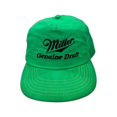 Vintage Miller Genuine Draft neon green hat with embroidered black logo -Officially Licensed Miller product -leather strapback closure  -slight yellowing around the inner band -Vintage items may come with minor flaws due to pre-loved wear. Color of product may slightly vary compared to photo due to lighting. Please enjoy and appreciate this item with its character. Miller Genuine Draft, Green Hat, Green Hats, Santa Clara, Vintage Band, 1980s Vintage, Vintage Love, Black Logo, Neon Green