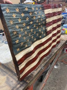 an american flag is being worked on in a shop