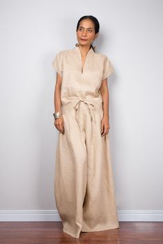 "Linen pants, Handmade natural linen long wide leg palazzo pants. Beige brown high waist women's summer pants Made with the highest care this beautifully crafted garment will fit you perfect thanks to the elastic strap on the back. I like wearing this one when sitting in the garden reading a book and dream away. Soul of the Orient Collection - Original Design & Produced by NUICHAN PRODUCT SIZE : One Size Fits Most * Waist : elastic round waistband up to 26 - 38\" * Hips : (max 40\") if your Summer Ramie Bottoms, Casual Beige Maxi Bottoms, Linen Full-length Harem Pants For Spring, Spring Linen Harem Pants, Full Length Linen Harem Pants For Spring, Spring Full Length Linen Harem Pants, Full-length Beige Linen Pants, Summer Vacation Brown Wide Leg Pants, Solid Color Linen Wide Leg Harem Pants