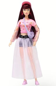 a barbie doll wearing a pink top and white skirt