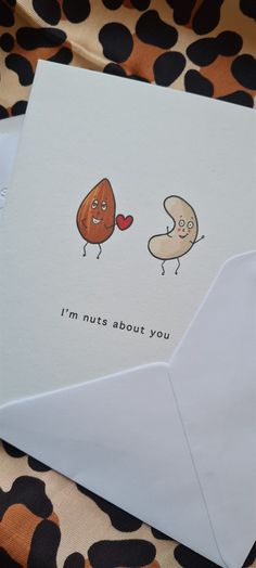 an envelope with a card that says i'm nuts about you