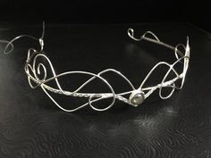 I've fabricated a sterling silver Elvish bespoke wedding tiara, an ethereal-inspired bridal headpiece, which can be set with your choice of an 8mm gemstone, which rests centered in the circlet. It's a beautiful headpiece for any themed event such as a Renaissance Festival or Celtic/Medieval wedding, or for any alternative bridal style. The circlet is fabricated entirely in sterling silver, meaning there are no base metals such as nickel or other lesser alloys which promote tarnishing. This piece Elvish Wedding, Celtic Medieval, Forehead Jewelry, Real Gold Chains, Moon Necklace Silver, Silver Head Piece, Felt Pouch